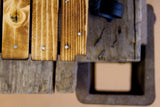 Handcrafted notched corner and torched wood grain on a miniature industrial cart replica.