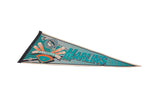 Vintage 1990s Florida Marlins logo and baseball diamond graphic on a teal felt pennant.