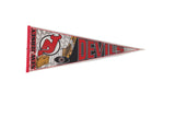 Vintage 1990s New Jersey Devils triangular felt pennant, red and black logo, 12x29.