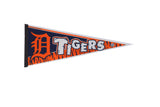 Vintage Detroit Tigers felt pennant in navy blue with orange tiger stripes and bold white lettering.