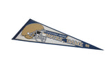 Angled view of the Notre Dame pennant highlighting the gold helmet and blue text.