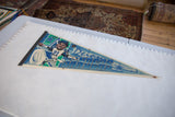 Vintage Dion Sanders Dallas Cowboys felt pennant with visible creases and minor edge wear.