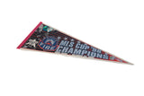 Detail of vintage felt Chicago Fire 1998 MLS Cup Champions pennant with red and blue logo.