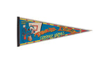 Vintage 1996 Atlanta Summer Games felt pennant with Team Izzy mascot playing basketball.