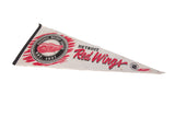 Vintage Detroit Red Wings felt pennant, left end with red, white, and black NHL logo.