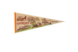 Vintage Mackinaw City Michigan felt pennant with classic illustrated local landmarks.