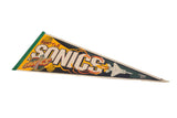 Seattle Sonics felt pennant with cream lettering, orange outline, basketball graphic, and green edge.