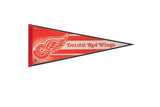 Vintage Detroit Red Wings felt pennant, red and white winged wheel logo, 12x29.