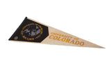 Vintage University of Colorado pennant's black left section, gold text, and gray buffalo.