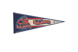 Vintage Columbus Blue Jackets felt pennant with team logo and lettering in red, blue, and cream.