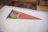 St. Louis Cardinals felt pennant laid flat on a measuring board.