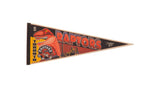 Vintage 1990s Toronto Raptors felt pennant featuring red dinosaur and city skyline, 12x29.