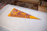 Maroon and gold vintage felt pennant, showing Golden Gophers mascot and Minnesota text.