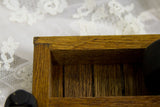 Reclaimed mahogany mini cart's notched corner joint, slatted bottom, and wood grain.