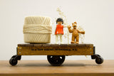 Reclaimed Mahogany Mini Cart with clear lacquered wood, antique metal wheels, and Old New House branding.