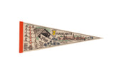 Vintage 1990s Frankenmuth Michigan felt pennant with colorful illustrated village scene.