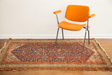 Tattered vintage Hamadan tribal rug, indigo blue, red, and cream geometric patterns, 4'3