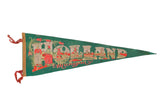 Green vintage Holland Michigan felt pennant featuring cream lettering and red Dutch scene, 9x27.