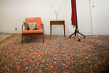 Intricate tribal Herati motif on a vintage Persian Hamadan rug, burnt orange and blue.