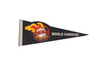 Vintage black felt pennant for Packo's at the Park featuring a red and yellow flaming baseball logo.