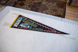 Vintage Alaska felt pennant close-up, featuring the polar bear design and yellow trim.