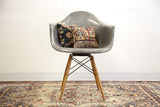Elephant grey Eames PAW swivel chair with rope edge and birch dowel base.