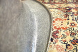 Fibrous elephant hide grey Eames chair shell with exquisite rope edge detail.