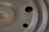 Seng Chicago mark on the dark metal swivel base with aged patina.