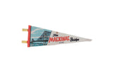 1970s vintage Mackinac Bridge felt pennant with blue graphic and red text.