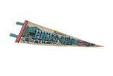 Circa 1970s Pikes Peak felt pennant with blue text, mountain illustrations, and pink edge.