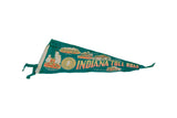 Vintage Indiana Toll Road pennant shown at an angle, revealing ripples in the green felt.
