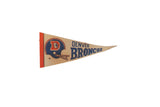 Vintage 1970s Denver Broncos felt pennant with blue helmet logo, time-softened cream, orange.