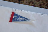 Blue and white New York Giants felt pennant displaying helmet logo and minor creases.