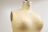 Vintage Wolf Model 1969 dress form 38, beige linen with subtle texture and patina.