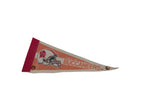 Vintage Tampa Bay Buccaneers pennant from an angle, highlighting its orange graphics and felt texture.