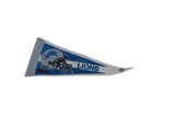 Aged felt texture and time-softened graphics on the vintage Detroit Lions pennant.