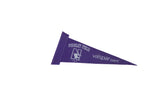 Angled shot of the purple Wrigley Field Northwestern felt pennant showing white graphics.