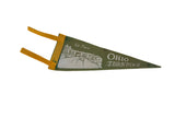 Angled view of the vintage Ohio Turnpike pennant showing its natural curl and aged felt texture.