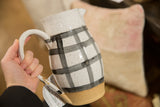 Handmade ceramic black and white pitcher, hand painted gingham design, speckled glaze.