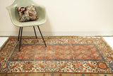 Worn antique Persian Bakshaish rug with natural red, blue, camel, seafoam green dyes.