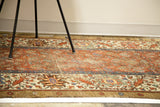 Antique Bakshaish rug detail showing naturally dyed, heavily worn red, blue, and camel wool.