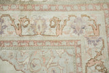 Distressed, soft mercerized cotton pile with pale pink scrolling floral patterns.