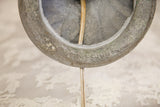 Cambridge stamp on the vintage table lamp's aged metal base with old wiring.