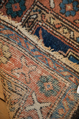 Coarse hand-knotting and woven foundation of an antique Persian Heriz rug.