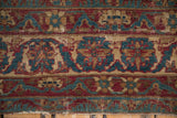 Kermanshah rug, red, teal, camel floral arabesques showing mostly even wear and visible foundation.
