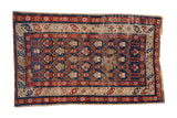 Antique Caucasian rug, geometric botehs and palmettes in blue, red, ivory.