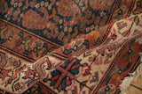Hand-knotted pile of antique Malayer rug, showing vibrant boteh patterns and varied colors.