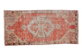 Vintage Distressed Oushak runner with faded blush red and beige hexagonal medallion, textural wear, 2'x4'2