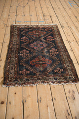 Antique Mehriban rug corner: visible foundation wear, intact selvage, and vine border.