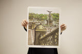 Colorful vintage Central Park lithograph featuring Bethesda Fountain, green trees, and architecture.